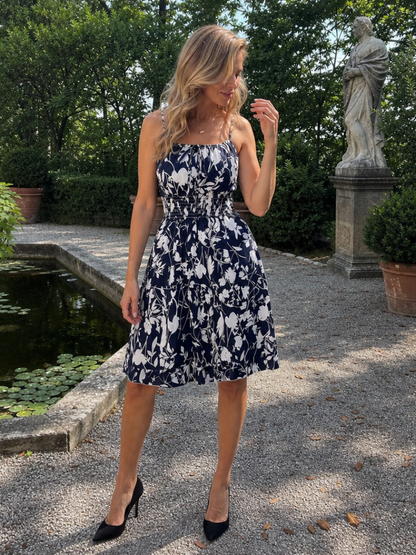 Women's Knee-Length Sleeveless Dress with Smocked Waist